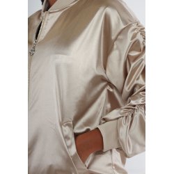 Jakke i guld og med masser af strk